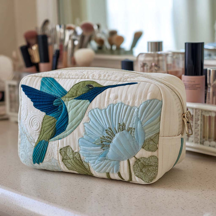 Trousse de Maquillage Matelassée aux Ailes Étincelantes
