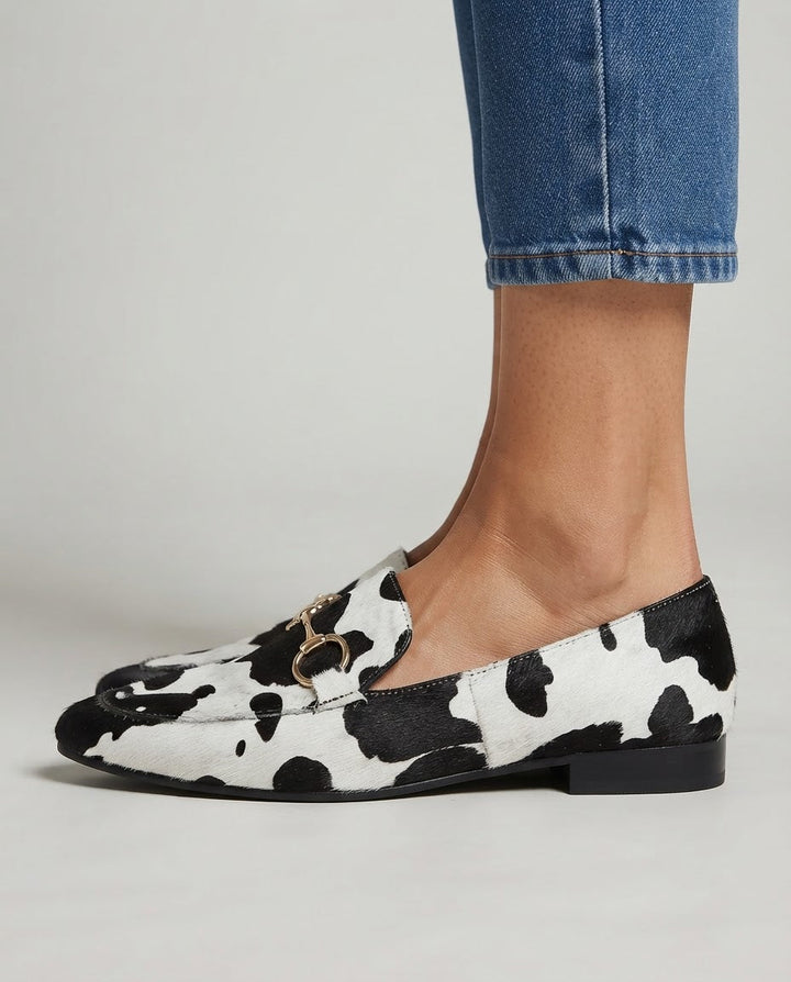 Mocassins en cuir avec poils imprimés léopard noir et blanc